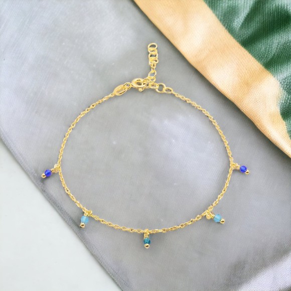 Bransoletka pozłacana z niebieskimi kamieniami