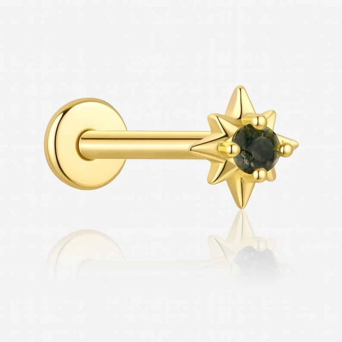 Piercing zielony kamień.jpg